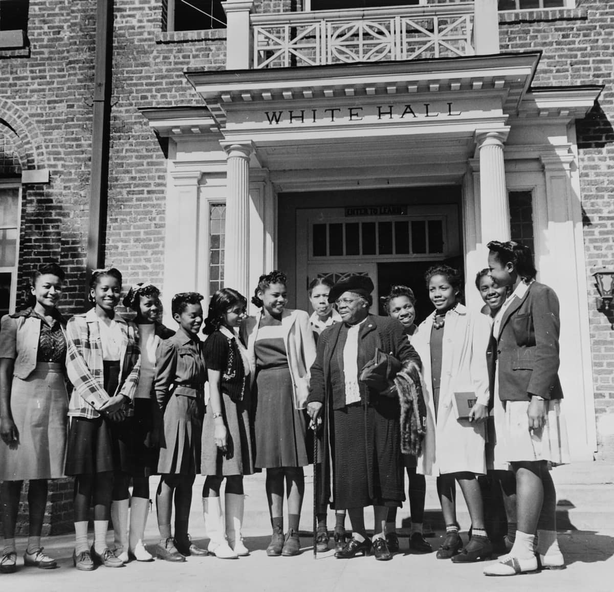 Daytona Beach, Florida. Bethune-Cookman College. Dr. Bethune saying goodbye to a group of students after resigning as president of the college LCCN2017843192